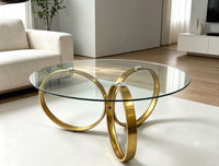 DecorMama Modern Luxury Gold Ring Base Round Glass Coffee Table – room setting