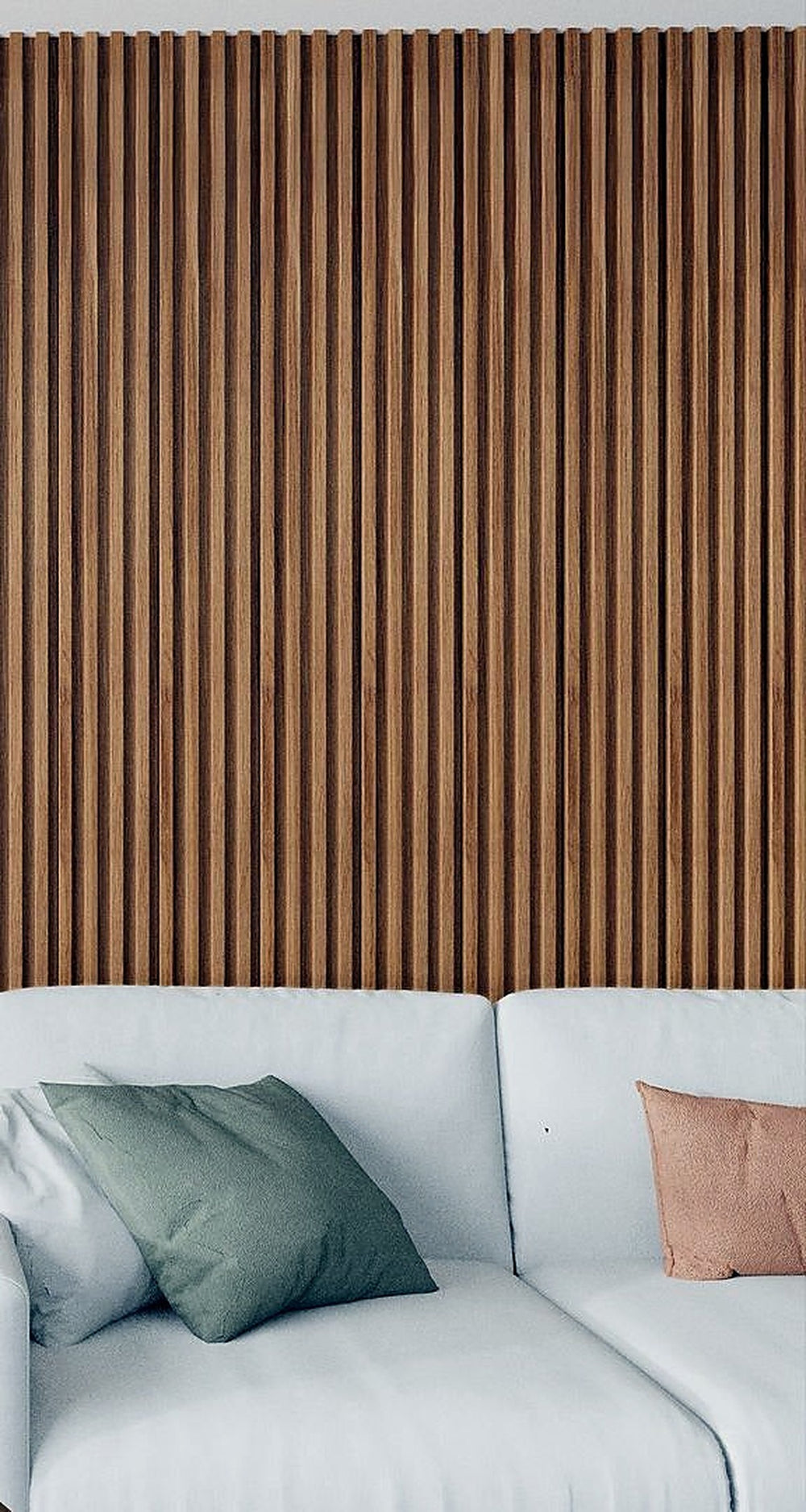 DecorMama Wood Slat Wall Panels, brown wood slat feature wall behind a white sofa